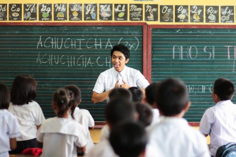 Krus Na Ligas Elementary School's Teacher August leads his class with an energizer.