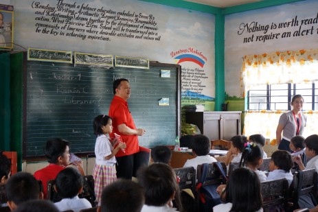 Children's author and publisher Ramon Sunico is interviewed in Teacher Noelle's English class.